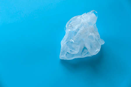Ice on a blue background.の写真素材
