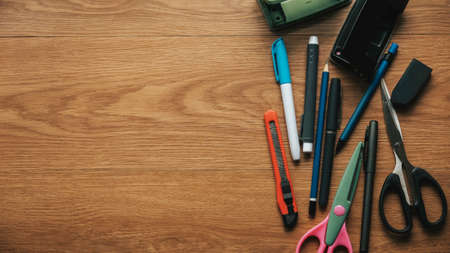 Set of stationery on wooden background with copy space.の写真素材