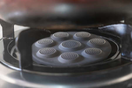 Closeup shot of domestic kitchen stove.Gas cooker with burning flames of propane gas.の写真素材
