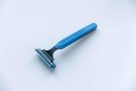 Disposable razor isolated on a white background.