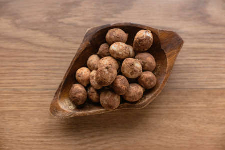 Bambara groundnut or Vigna subterranea which still covered with soil.Vigna subterranea ripens its pods underground, much like the peanut. They can be eaten fresh or boiled after drying.の写真素材