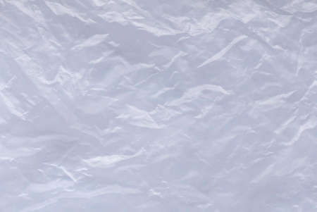 White and crumpled plastic bag background and texture.の写真素材
