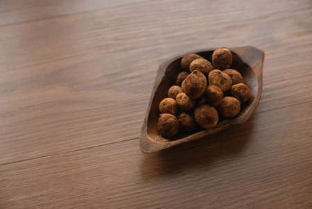 Bambara groundnut or Vigna subterranea which still covered with soil.Vigna subterranea ripens its pods underground, much like the peanut. They can be eaten fresh or boiled after drying.の写真素材