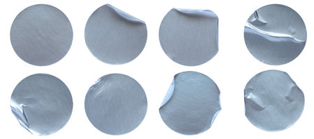 A set of blank silver grey round adhesive paper sticker label isolated on white background.の写真素材