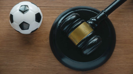 Law and soccer sport.Football coach accused. Concussion lawsuit.の写真素材