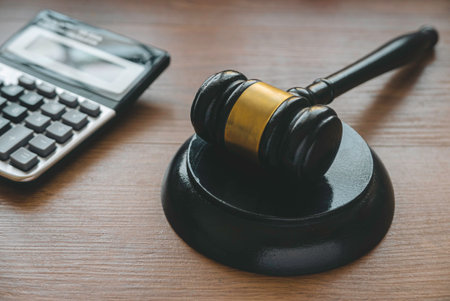 Law and finance. Bankcruptcy, tax law, bribe, corruption, arbitration, penalty concept.Gavel and...