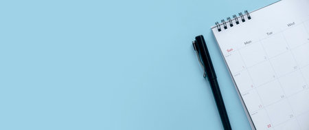 Concept of plan a monthly calendar for meetings or manage your daily activities.Blue banner. Copy space.の写真素材