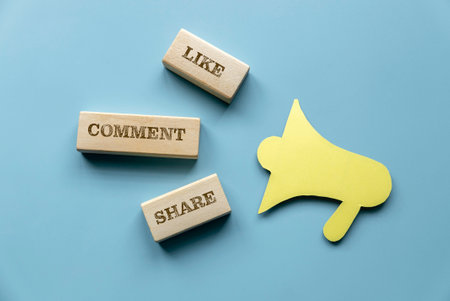 Like, comment and share over megaphone icon. Social media announcement, marketing or promotion concept.の写真素材