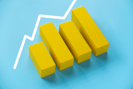 Business charts. Company financial report. Goal for business, bank, finance, investment, money. Quarterly report concept. Yellow bar chart.の写真素材