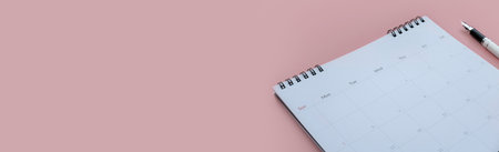 Concept of plan a monthly calendar for meetings or manage your daily activities.Pink banner. Copy space.の写真素材