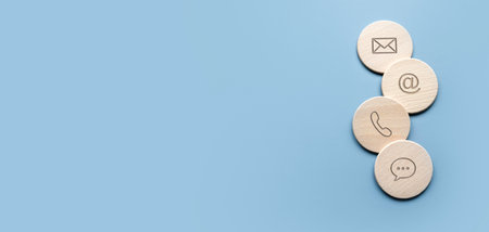 Icon of communication type on wooden circle. Contact us or Customer support hotline people connect.の写真素材