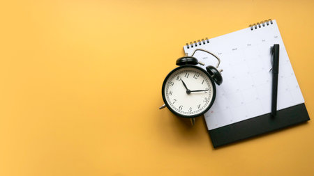 Concept of plan a monthly calendar for meetings or manage your daily activities.Yellow banner. Copy...