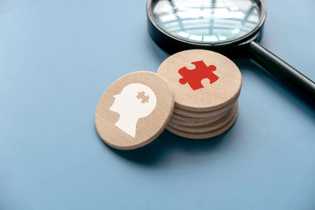 Concept of mental health problem, autism, memory loss,dementia epilepsy and alzheimer awareness. Puzzle and head icon.の写真素材