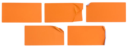 A set of fluorescent neon orange rectangular paper sticker label isolated on white background.の写真素材