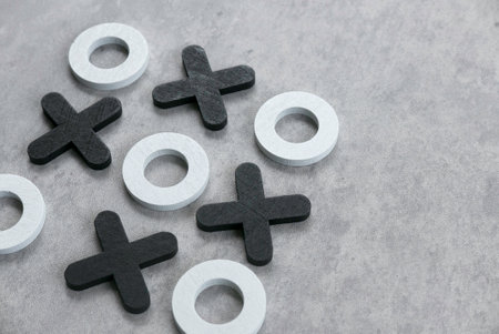 Wooden Tic Tac Toe Game on a Table: Classic Strategy and Fun for All Agesの写真素材