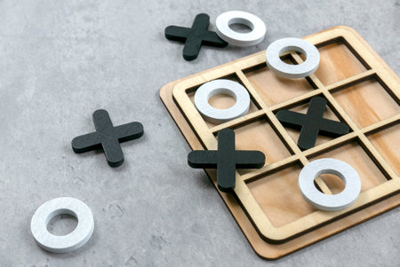 Wooden Tic Tac Toe Game on a Table: Classic Strategy and Fun for All Ages