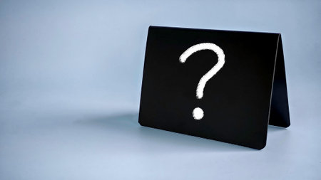 Chalkboard or Blackboard Featuring a Prominent Question Symbol Representing Inquiry, Curiosity, and the Quest for Knowledgeの写真素材
