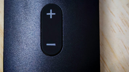 Minimalist Volume Control Button on a Modern Deviceの写真素材