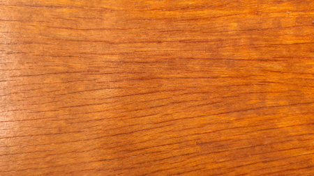 Close-Up of Natural Wooden Texture with Warm Brown Tones and Visible Grain Patternsの写真素材