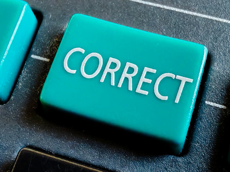 Close-up of Teal "CORRECT" Key on Keyboard, Signifying Accuracy, Validation, and Problem Solvingの写真素材