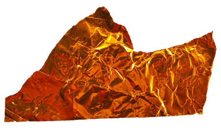 Crumpled Gold Foil Strip on White Backgroundの写真素材
