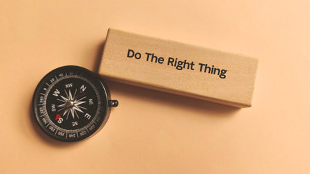 Do The Right Thing Text with a Compass on Wood Block Representing Moral Guidance, Ethics, and...