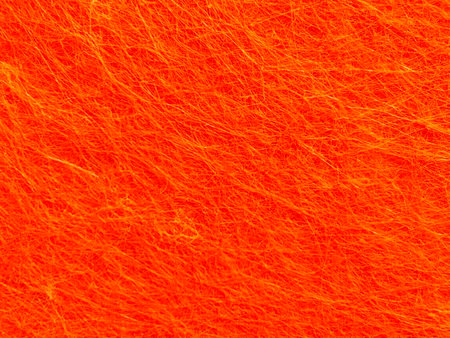 Fine Detailed Close-Up of orange Non-Woven Felt Fabric Textile Texture for Background and Designの写真素材