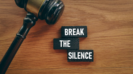 Break The Silence Text on Blocks Next to Gavel Symbolizing Justice, Advocacy, and Speaking Outの写真素材