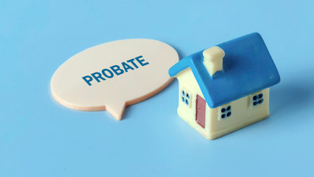 Miniature House Model and Speech Bubble with the Word 'PROBATE' Representing Legal Estate Planning and Property Inheritanceの写真素材