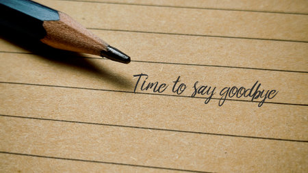 Time to Say Goodbye Message Written on Lined Vintage Paper with Pencil Farewell Conceptの写真素材