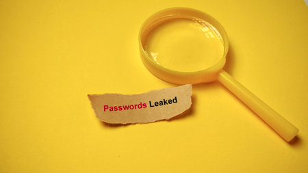 Magnifying glass investigating Passwords Leaked cyber security breach, symbolizing data risk,...