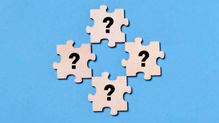 Asking Questions and Problem Solving Concept with Four Puzzle Piecesの写真素材