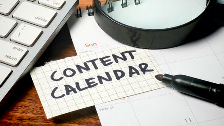 Digital Marketing Strategy: Planning a Content Calendar on Desk with Calendar and Magnifying Glassの写真素材