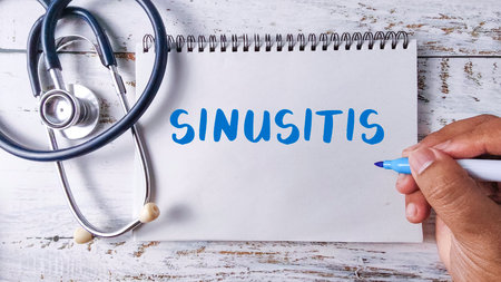 Sinusitis Medical Diagnosis and Treatment Concept with Stethoscope and Hand Writing on Notepadの写真素材
