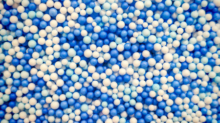 Vibrant Blue and White Polystyrene Foam Beads Texture Backgroundの写真素材