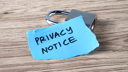 Privacy Notice Concept with Padlock on Wooden Background Highlighting Data Protection and Digital Securityの写真素材