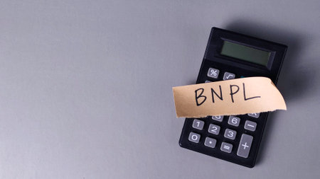 BNPL Concept Note on Calculator: Buy Now Pay Later Financial Strategy and Consumer Creditの写真素材