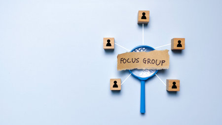 Focus Group Marketing Research Concept with Wooden Blocks People Icons and Magnifying Glassの写真素材