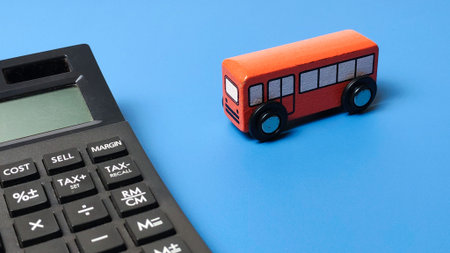 Transportation Budget and Public Transit Cost Calculation with Toy Bus and Calculator