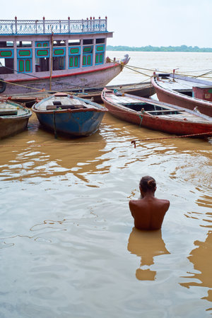 Morning Ablutions in the Ganges in Varanasi, Indiaの写真素材
