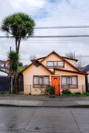 Wooden house painted in beigeの写真素材