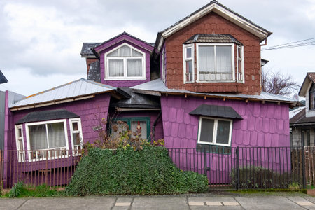 Wooden house painted in purple and brownの写真素材