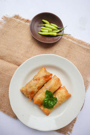 Lumpia or lunpia, is traditional spring roll skin snack from Semarang, Indonesia. Traditional Spring...