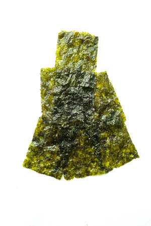 nori seaweed isolated on white background. Japanese food nori. Dry seaweed sheets.