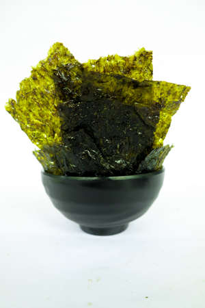 nori seaweed isolated on white background. Japanese food nori. Dry seaweed sheets.