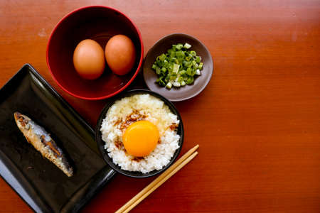 "tamago kake gohan or raw egg on rice. 
traditional food from japan, eat on breakfast"の写真素材