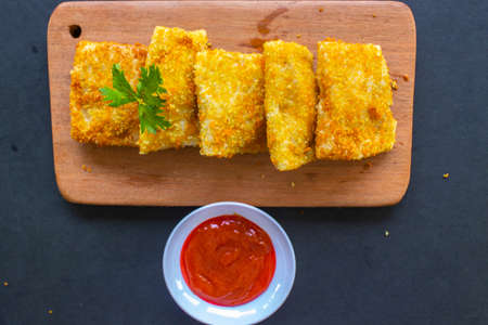 Fried Risoles or Risol Mayo are Indonesian snacks. Like Coxinha de Galinha. served with chili sauce,...