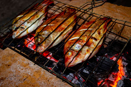 grilled fish, grilled fish nile Tilapia grilled on hot charcoal