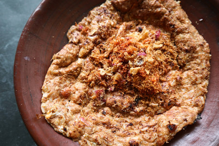 kerak telor or Egg Crust. kerak telor is Spicy Glutinous Rice Omelette with Grated Coconut. made...