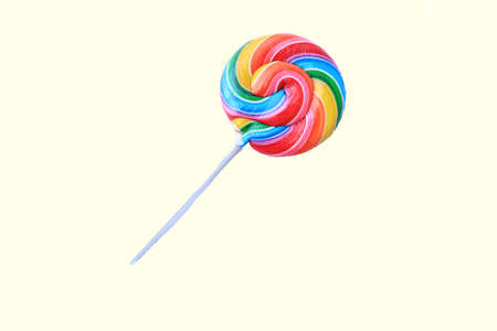 lollipop, Colorful rainbow lollipop swirl on plastic stick isolated on white backgroundの写真素材